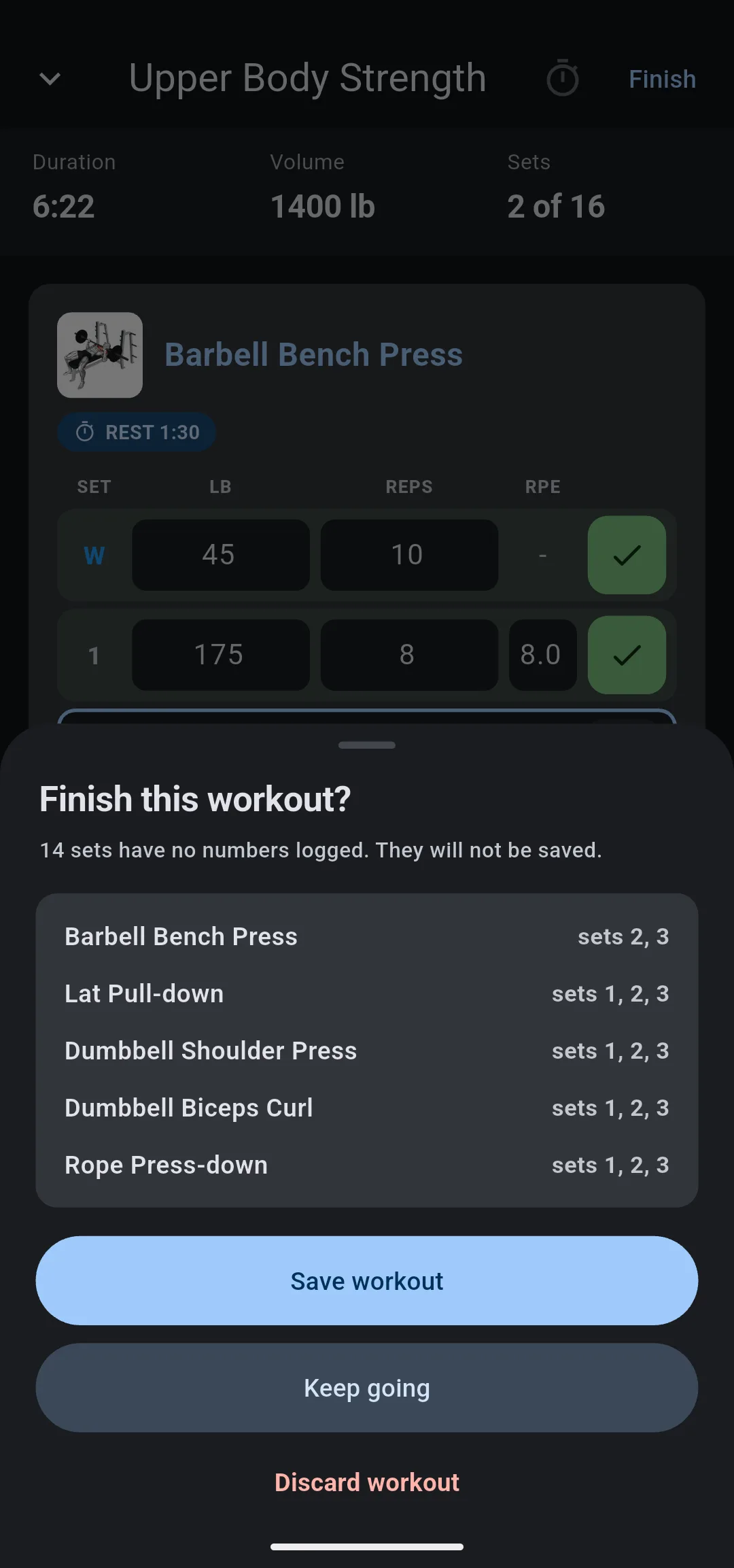 Finish this workout? sheet saying 14 sets have no numbers logged, listing each exercise with its unlogged sets, above Save workout, Keep going and Discard workout